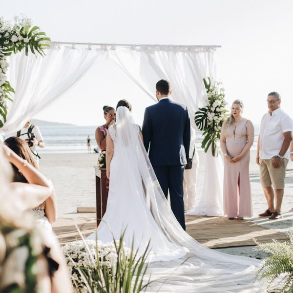 newly wed couple on isle getting married at shore